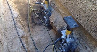 steel piers installed for foundation repair and concrete repair